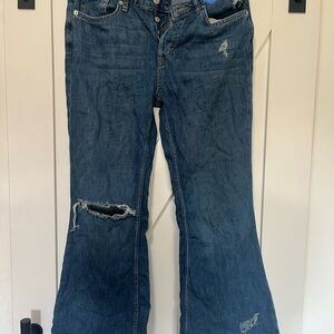 Free People 
We The Free Flare Jeans in Distressed Blue.